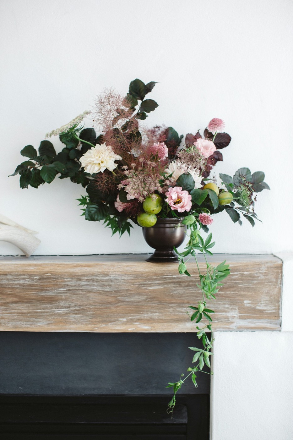 A footed urn centerpiece for an event table