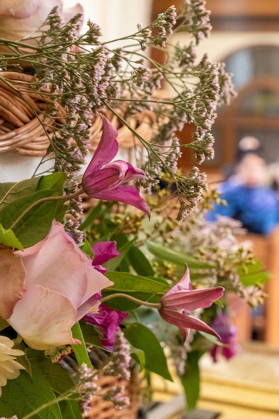 Pink and mauve blooms at a large event