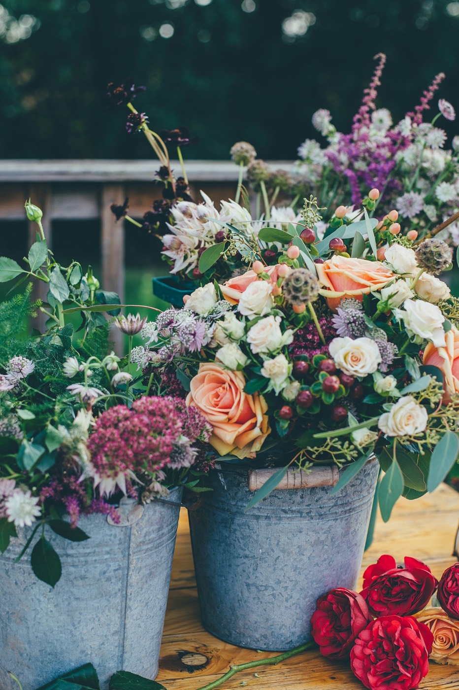 Garden flowers in galvanised buckets